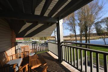 Фото номера Дом с 5 спальнями Кемпинги Riverside Villa г. Luunja 10